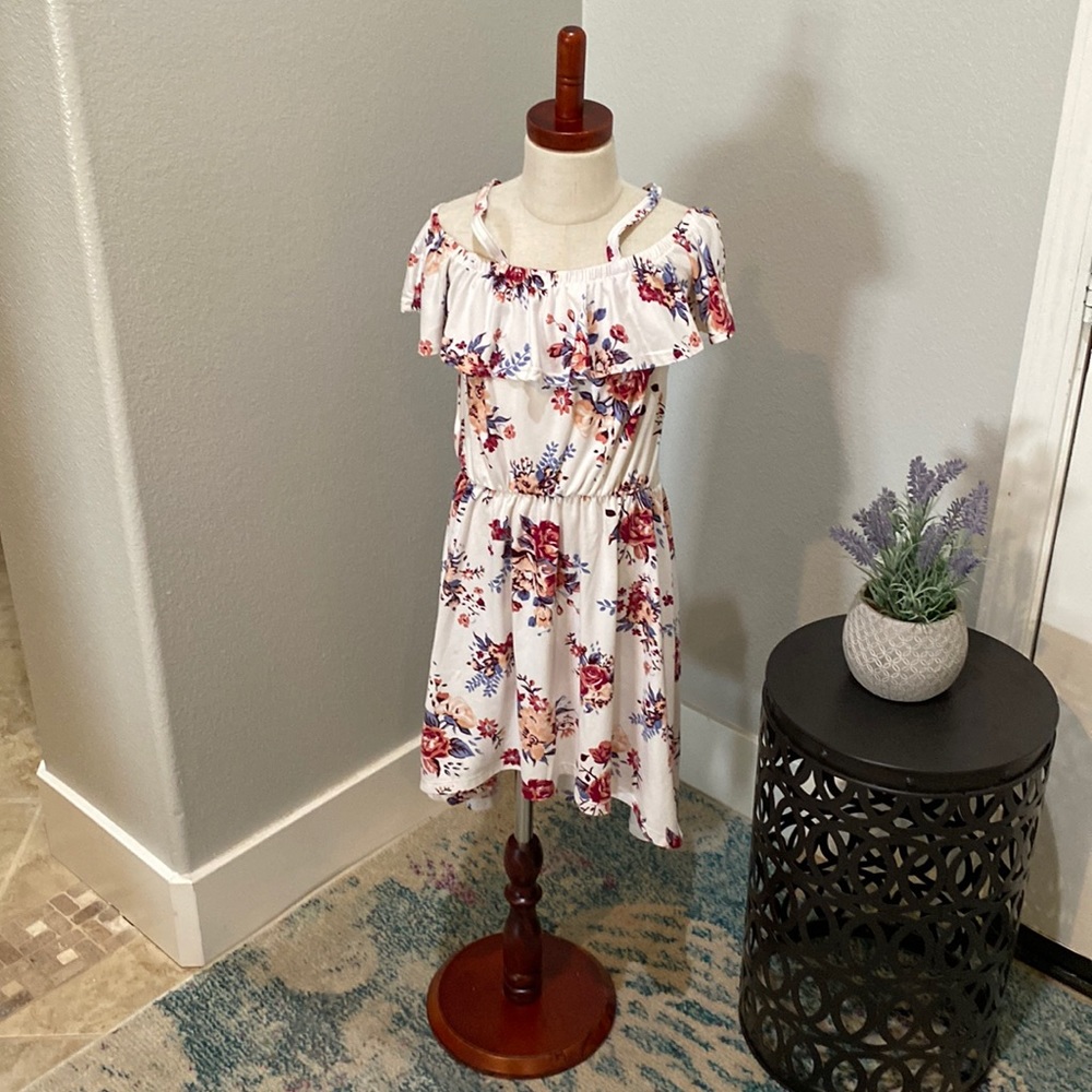 Cute off  or on the shoulder dress it’s a little shorter in front than back